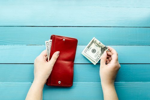 A wallet with some money and a twenty-dollar bill | Cafeteria Plan | Midwest Employee Benefits